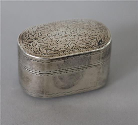 A George III bright cut engraved silver oval nutmeg grater, with hinged steel rasp, by Joseph Wilmore, 37mm.